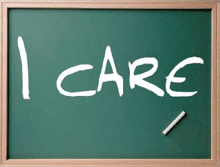 Foto di una lavagna con scritto "I Care"