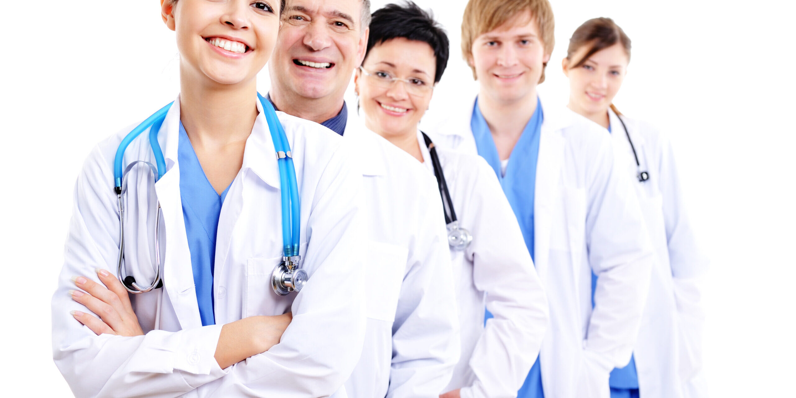 happy laughing female doctors in hospital gowns in row scaled